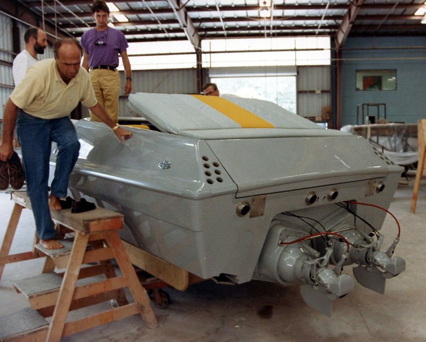 Inspecting the prototype: Horst Stross, the founder of Kineo in front, Dirk Schmauser and Jörg Tragatschnig of Porsche Design in the back