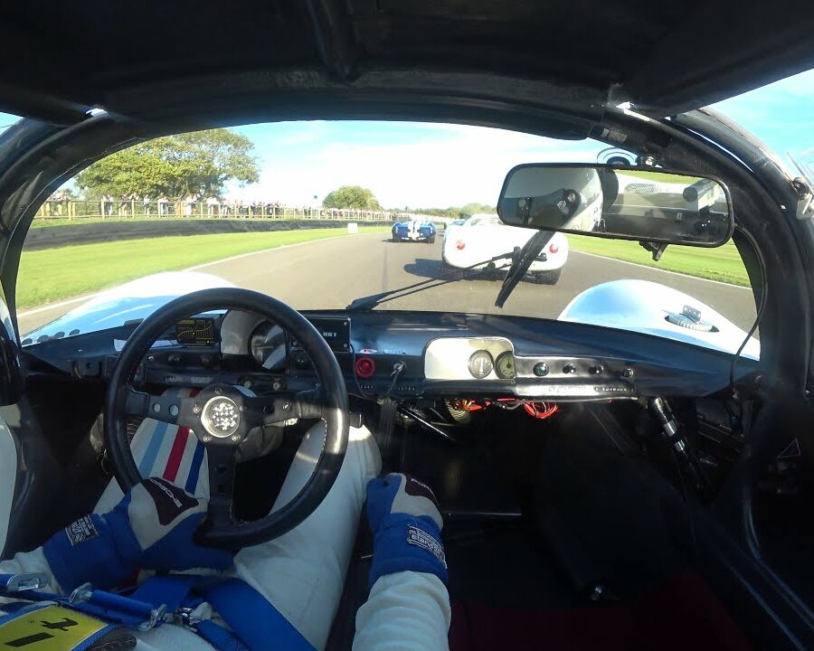 GOODWOOD REVIVAL 2019, Battle between 2 PORSCHE 910 in a field of lolas and mclaren w big V8 s