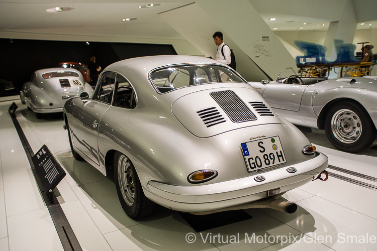 Porsche sports and racing cars on display within the exhibition hall of the new Museum