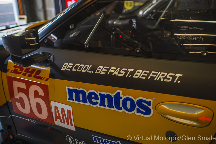 The #56 Project 1 Porsche 911 RSR being prepped in the pit garage ahead of practice on 2 May