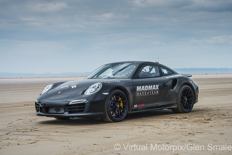 The 2015 Porsche 911 Turbo S waits on the beach to be driven by Zef Eisenberg