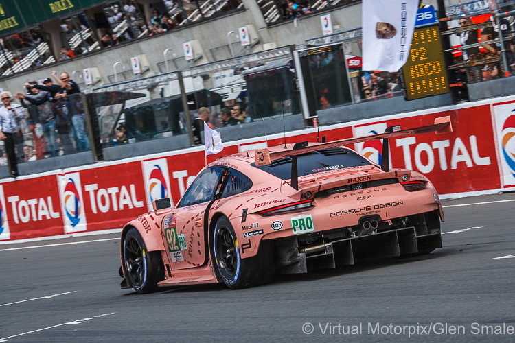 The #92 Porsche GT Team 911 RSR driven by Michael Christensen, Kévin Estre and Laurens Vanthoor crosses the finishing line to win the GTE Pro class