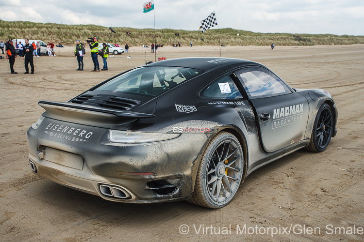 The Porsche 911 Turbo S looking decidedly battle weary