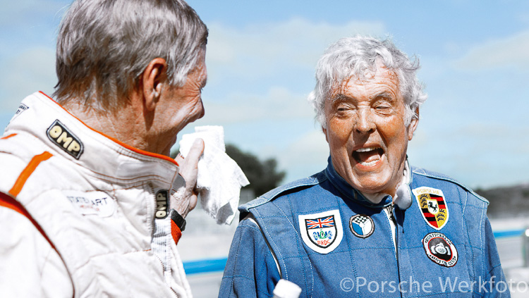 Racing legends Gijs van Lennep and Brian Redman share a joke at Laguna Seca