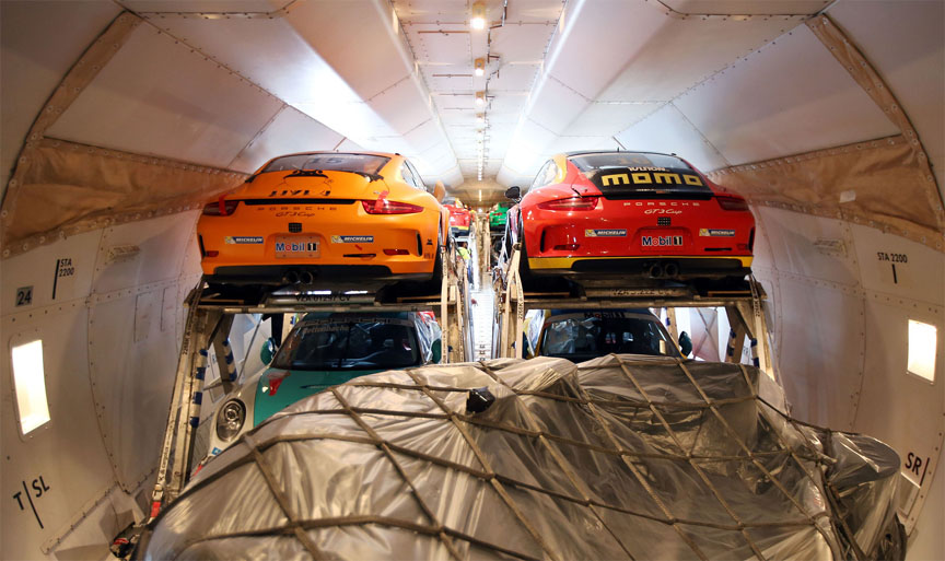 Porsche 911 GT3 Cup cars packed into the jumbo cargo jet