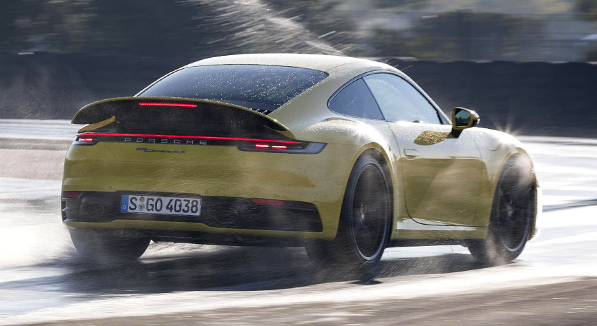 2019 Porsche 911 992 Carrera, rear spoiler up in Wet Mode