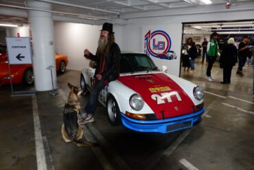 Magnus Walker at entry to new exhibit at Petersen Automotive Museum