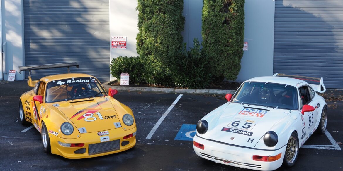 Porsche cars parked in lot